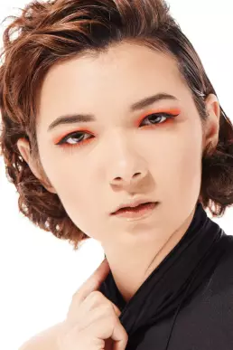 woman beauty orange eyes bright