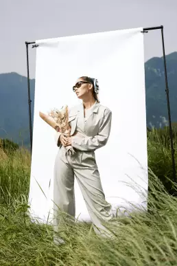 woman with flower sunglass bright
