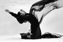 woman red dress underwater editorial